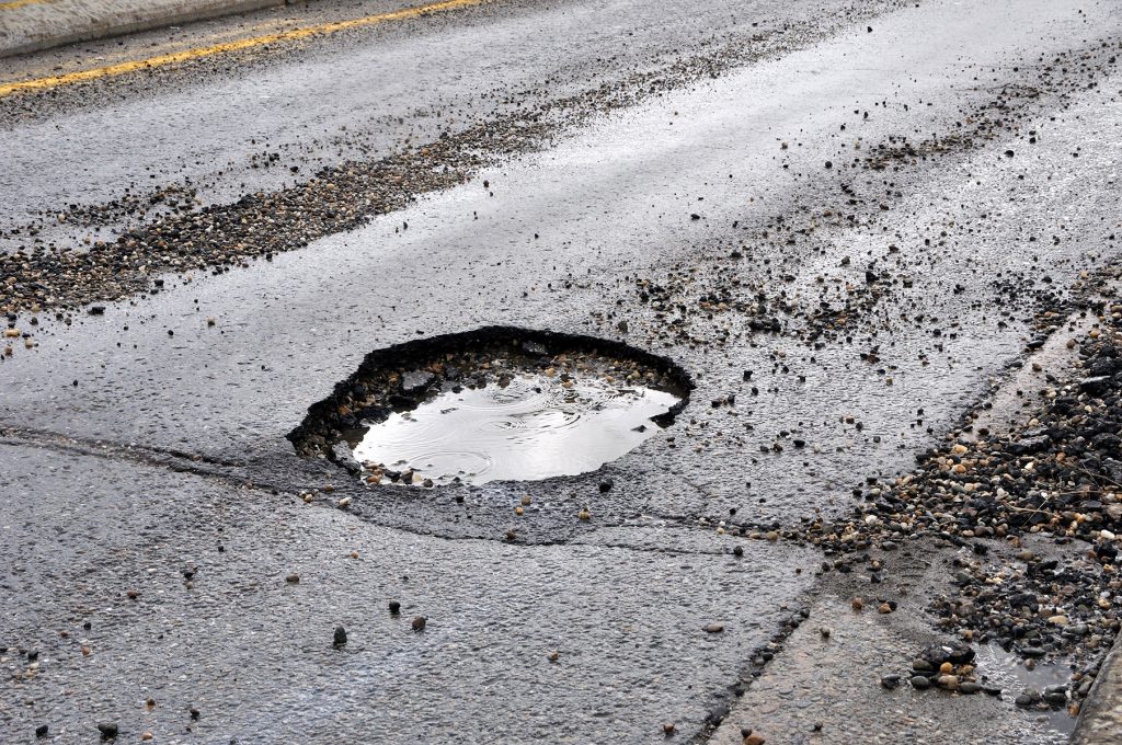 Large Pot Hole in the Road