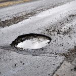 Large Pot Hole in the Road